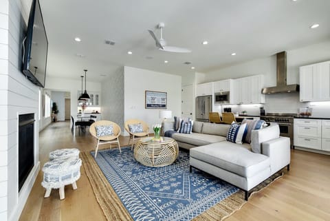 The living area opens to the kitchen and has beautiful views of the lake!