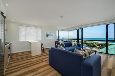 Executive Apartment, Sea View | Living area | LCD TV, fireplace, Netflix, heated floors