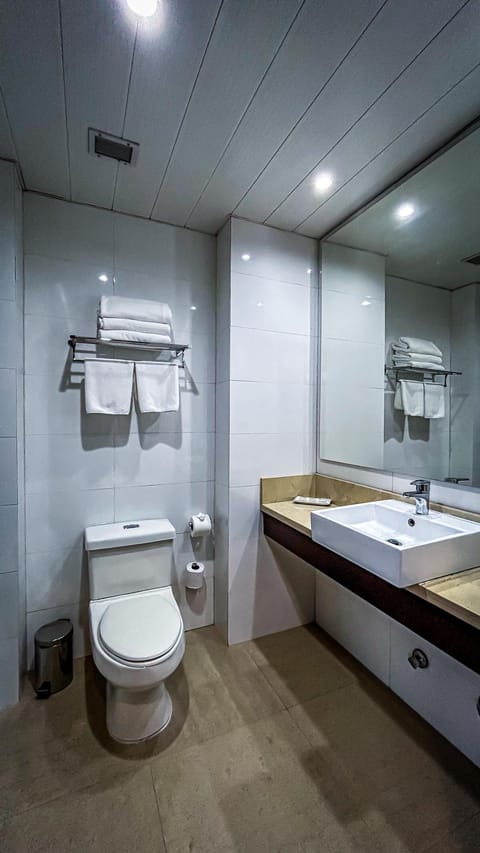 Family Triple Room | Bathroom | Combined shower/tub, hair dryer, towels