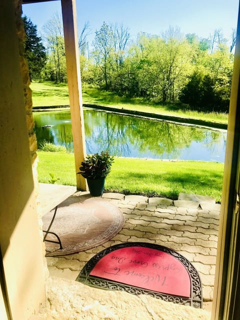 From your room. Each room has a small patio overlooking Spring fed pond.