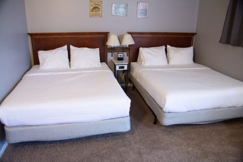 Standard Room, 2 Queen Beds | Blackout drapes, iron/ironing board, free WiFi, bed sheets