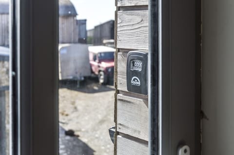 Apartment (1 Bedroom) | Living area | 32-inch flat-screen TV with digital channels, TV