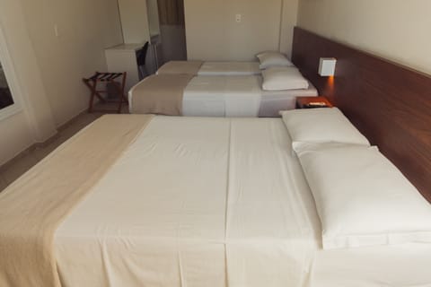 Standard Quadruple Room | Minibar, desk, iron/ironing board, free WiFi