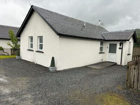 Front of the cottage, with parking facilities.