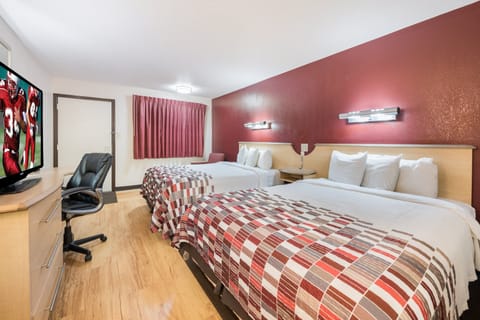 Deluxe Room, 2 Queen Beds, Non Smoking | Desk, laptop workspace, blackout drapes, free cribs/infant beds