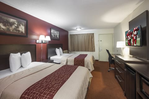 Deluxe Room, 2 Queen Beds, Non Smoking | Desk, laptop workspace, blackout drapes, iron/ironing board