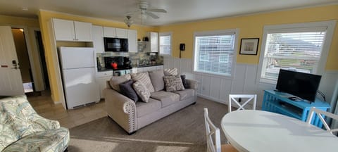 Sand Dollar Suite – Upstairs Ocean Front View | Living area | Flat-screen TV, DVD player