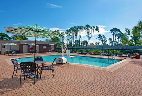 Outdoor pool, pool umbrellas, sun loungers