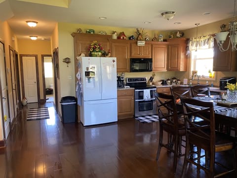 Kitchen, dining and hall to master, blue room, utility room & downstairs bath