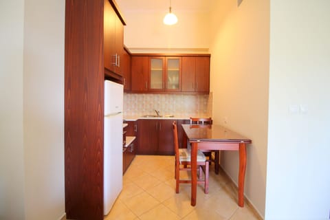 Family Room With Balcony | Private kitchen | Fridge, highchair, dining tables