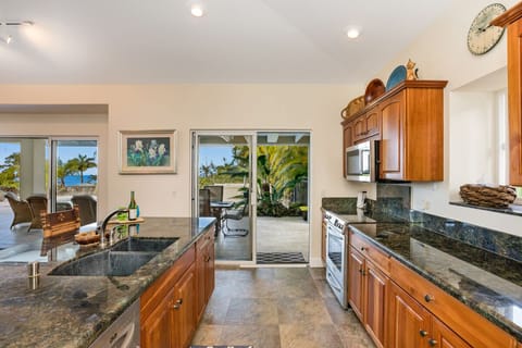 Complete Kitchen with Dining Table just outside.