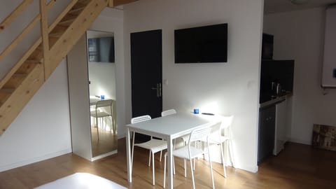 Family Studio | Living area | Flat-screen TV