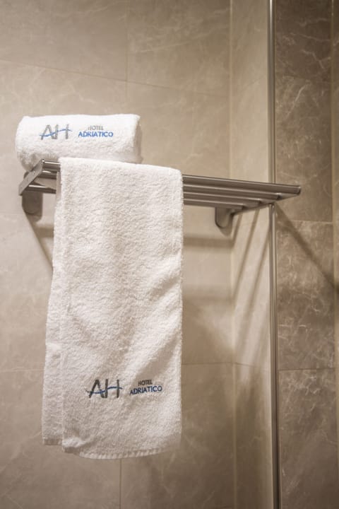 Double Room | Bathroom | Shower, hair dryer, bidet, towels