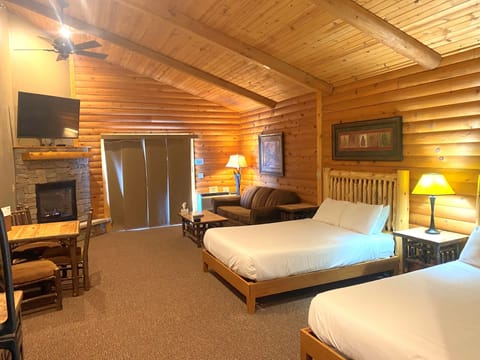 C 51R - Comfort Cabin, 2 Queen Beds, Pet Friendly, Mountainside (May hear neighbors) | Living area | Flat-screen TV