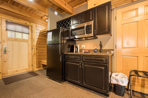 C 50R - Comfort Cabin, 1 King bed, Pet Friendly, Mountainside (May hear neighbors) | Private kitchen | Full-size fridge, microwave, coffee/tea maker, toaster