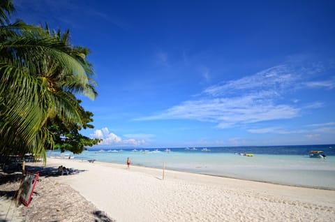 On the beach, white sand