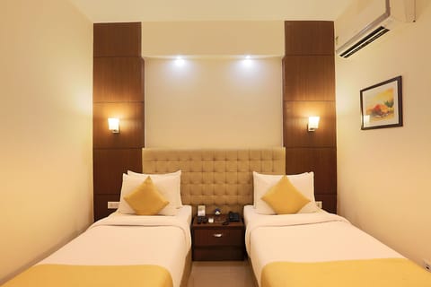 Deluxe Room | Premium bedding, minibar, in-room safe, desk