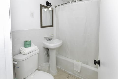 Deep soaking tub, eco-friendly toiletries, hair dryer, towels