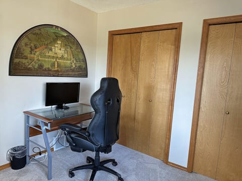 MASTER BEDROOM- Desk has slide-out keyboard tray + 2nd monitor & Ergonomic chair