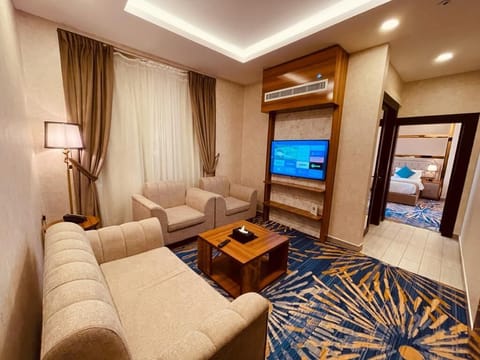 Junior Suite | Living area | 42-inch Smart TV with satellite channels, TV, video-game console