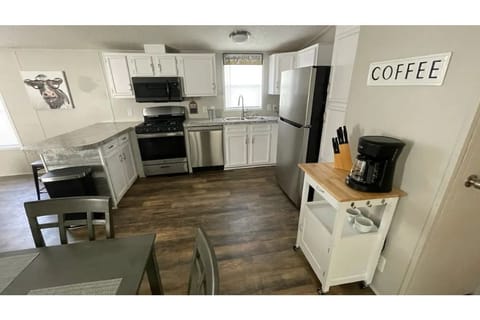 full kitchen with everything you need. pots, pans, dishes, glasses, dishwasher