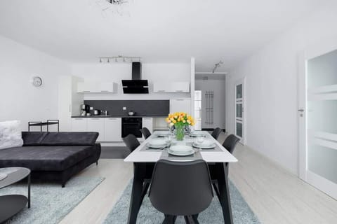 Living room of apartment Armii Krajowej 5/44 with table