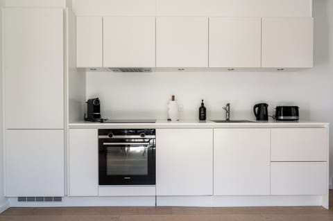 1 bedroom apartment | Private kitchen | Full-size fridge, oven, stovetop, dishwasher