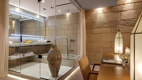 Superior Suite | Bathroom | Combined shower/tub, deep soaking tub, rainfall showerhead