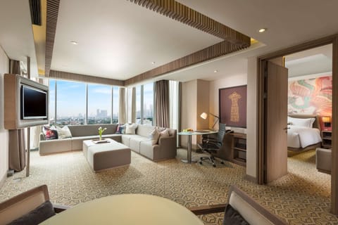 Superior Suite | Living area | Flat-screen TV, iPod dock