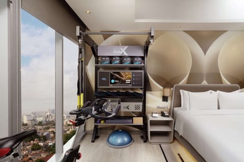 Room, 1 King Bed (Fitness) | Minibar, in-room safe, desk, laptop workspace