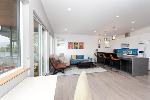 Durango, CO Vacation Rental Townhome - Durango, CO Vacation Rental Townhome
Living room with mountain views, large deck, and TV.