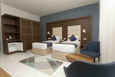 Standard Twin Room, City View | Premium bedding, in-room safe, individually decorated