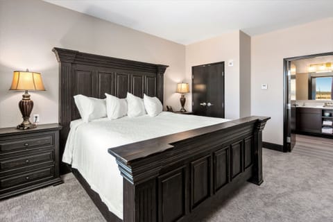 Premium Suite, Multiple Beds | Desk, laptop workspace, blackout drapes, iron/ironing board