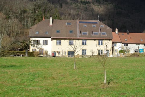 House. (see right part of the building)