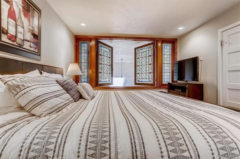 Another upstairs bedroom with queen bed