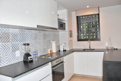 Luxury Apartment, 1 Bedroom | Private kitchen | Full-size fridge, microwave, oven, coffee/tea maker