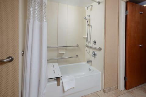 Room, 1 King Bed, Accessible, Bathtub (Non-smoking) | Bathroom | Combined shower/tub, hydromassage showerhead, designer toiletries