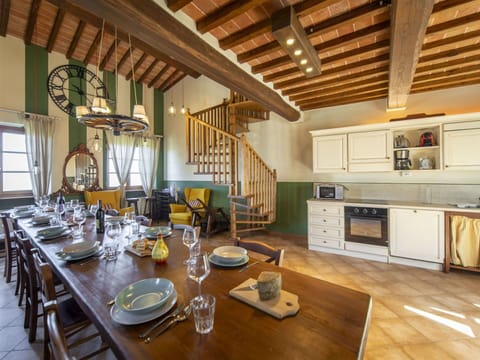 Table, Property, Furniture, Cabinetry, Countertop, Tableware, Wood, Lighting, Interior Design, Kitchen Stove