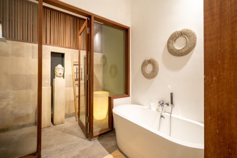 Deluxe Villa, 1 Bedroom | Bathroom | Separate tub and shower, rainfall showerhead, free toiletries