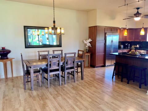 Beautiful sold wood dining table off kitchen.