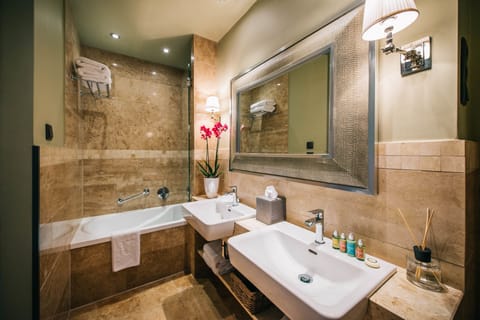 Suite | Bathroom | Rainfall showerhead, designer toiletries, hair dryer, towels