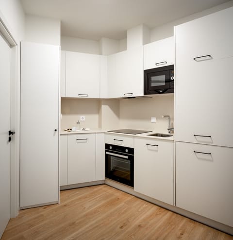 Apartment, 2 Bedrooms | Private kitchen | Fridge, microwave, stovetop, dishwasher