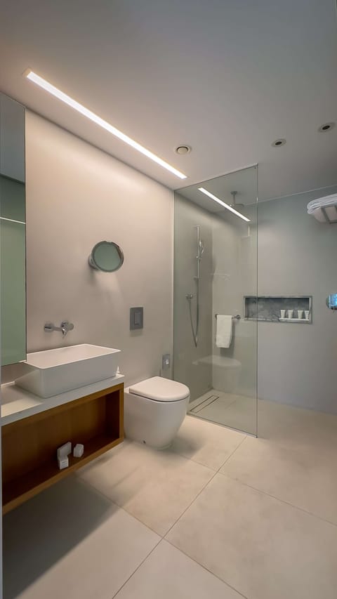 Suite, Terrace, Sea View | Bathroom | Shower, rainfall showerhead, designer toiletries, hair dryer