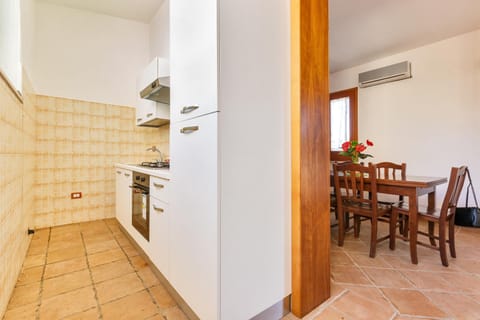 Villa | Private kitchen | Full-size fridge, oven