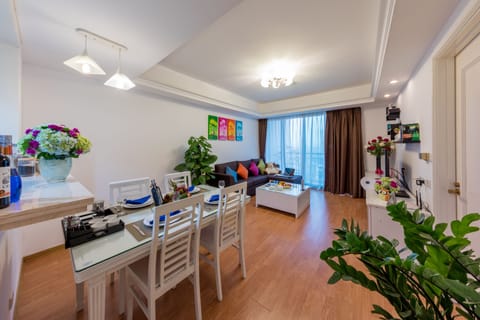 Deluxe Apartment, 2 Bedroom, City View | Living area | 40-inch LCD TV with cable channels, TV
