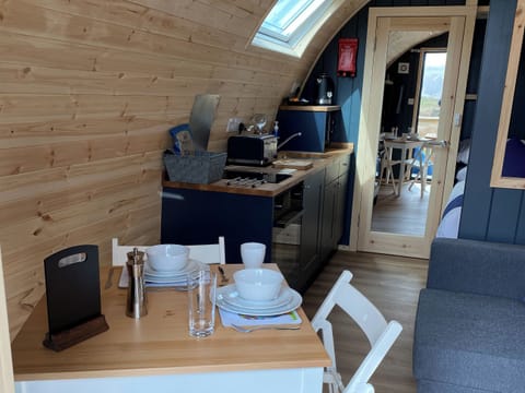 Delightfully compact living space | Maggie’s Cabin, Oban