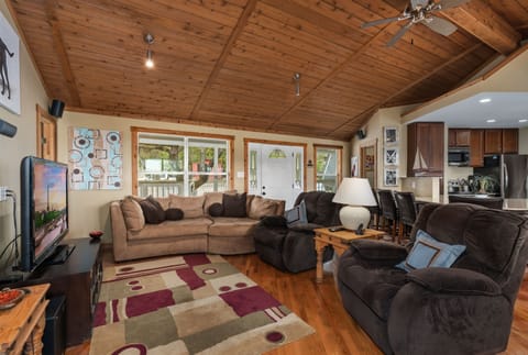 Main level TV Lounge. Massive comfy couch and reclining chairs. Movie time! 