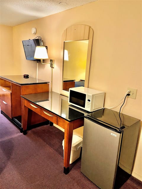 32-inch TV with cable channels, pay movies