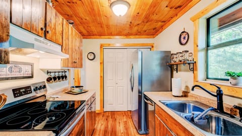 Cook in with our fully-equipped, galley style kitchen.