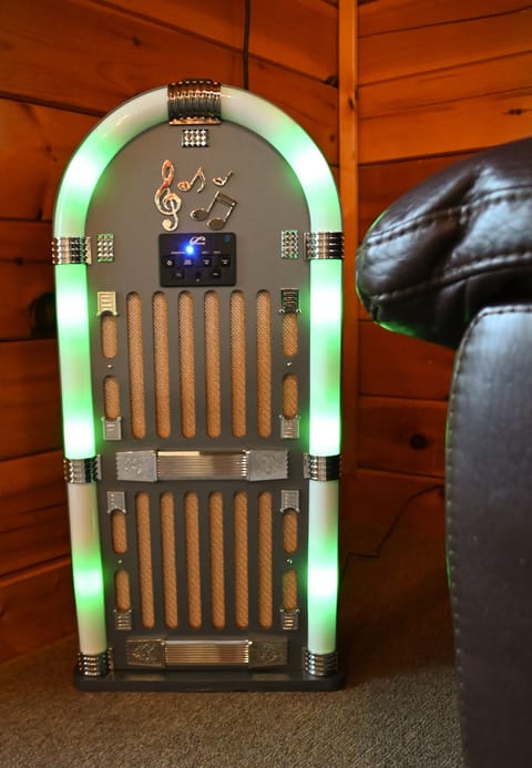 Light-up bluetooth jukebox in game room. Play music directly from your phone.